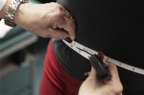 Obesidade vem crescendo no Brasil, segundo pesquisa Vigitel — Foto: AP Photo/M. Spencer Green, File   Mais da metade da população está 
