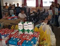 Alunos doam 352 litros de leite para o Lar São Vicente de Paulo